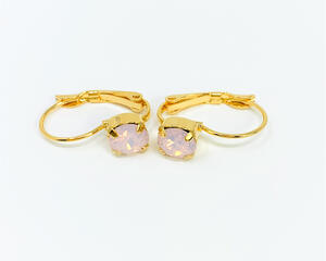 Pale pink crystal stone handset in a gold lever-back ear wire which has a base metal of brass. 